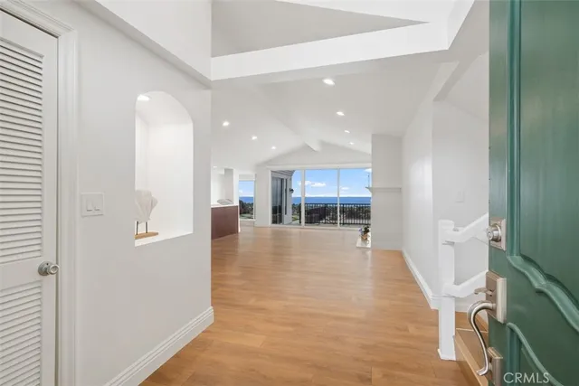 a kitchen with stainless steel appliances granite countertop wooden cabinets sink and stove top oven