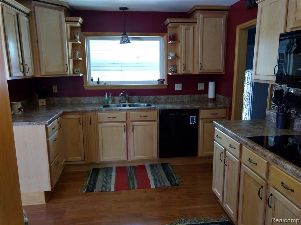 7565 Priemer Road Harbor Beach, MI 48441 - Photo 3 of 14 Beautiful natural maple cabinets