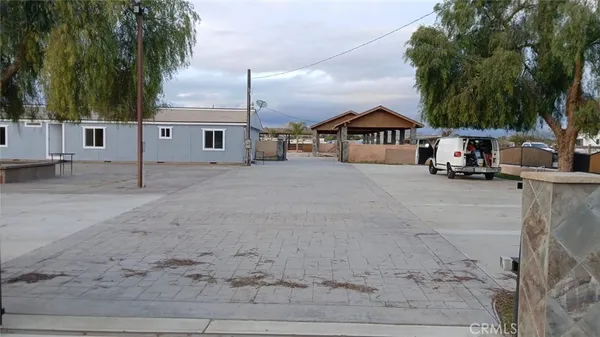 a view of a yard with an outdoor space
