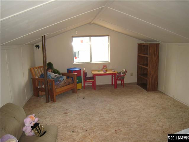 1750 O Farrell Street Reno, NV 89503 - Photo 11 of 13 a living room with furniture and a window