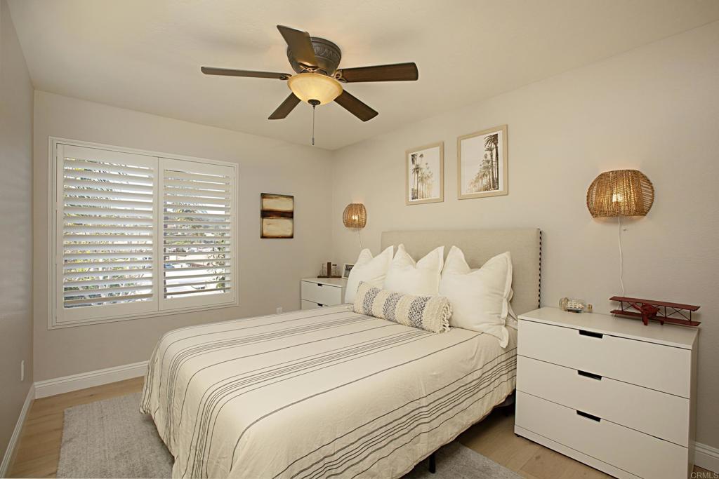1414 Flair Encinitas Drive Encinitas, CA 92024 - Photo 23 of 39 a bedroom with a bed and a window