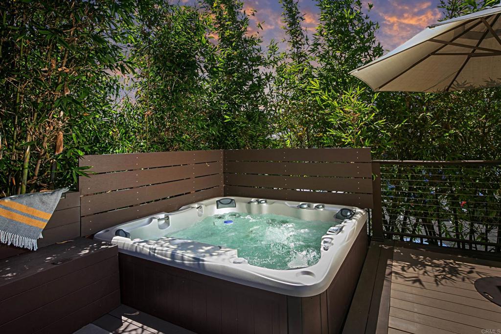 1414 Flair Encinitas Drive Encinitas, CA 92024 - Photo 31 of 39 a wooden bench sitting in front of a building