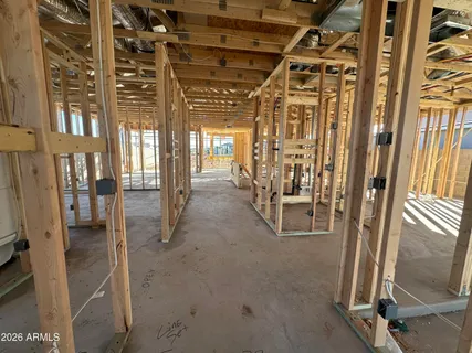 a view of an empty room with glass door