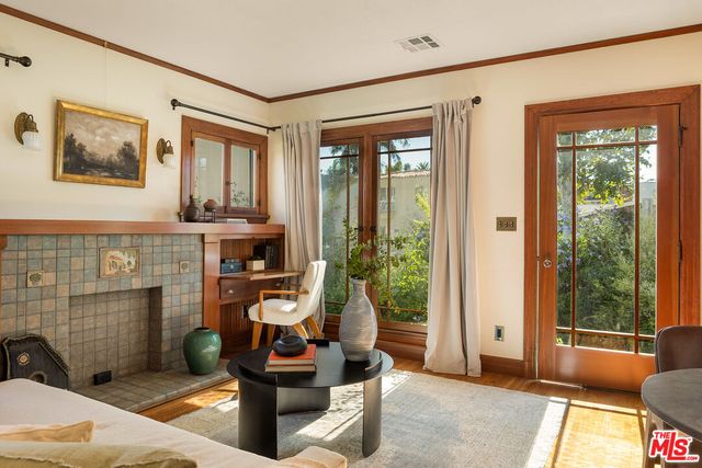 a view of a livingroom with furniture and front door