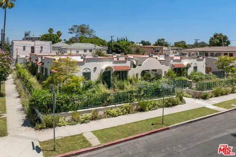 an aerial view of a city with lots of residential buildings