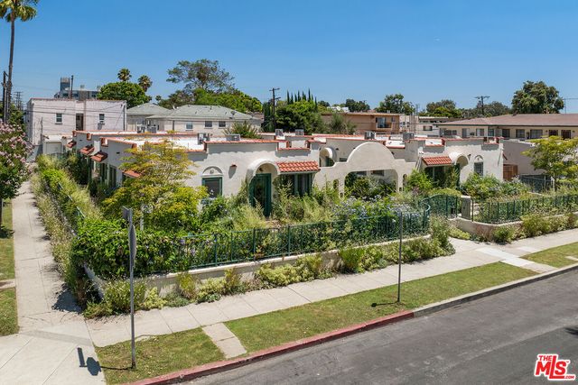an aerial view of a city with lots of residential buildings