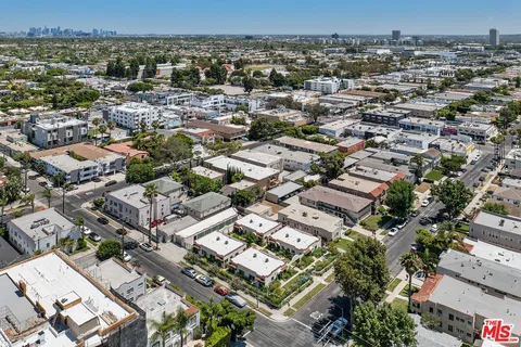 an aerial view of a city with lots of residential buildings