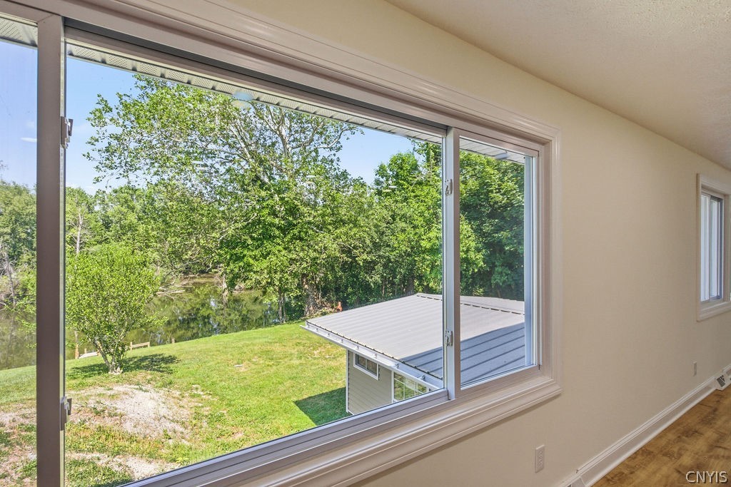 7016 Guyder Road Lysander, NY 13112 - Photo 17 of 41 Light and bright! total privacy!