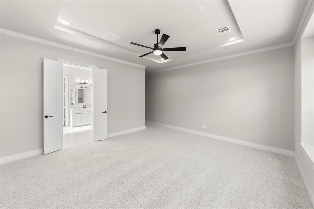 14994 Chipping Trail Frisco, TX 75035 - Photo 25 of 40 an empty room with fan and windows