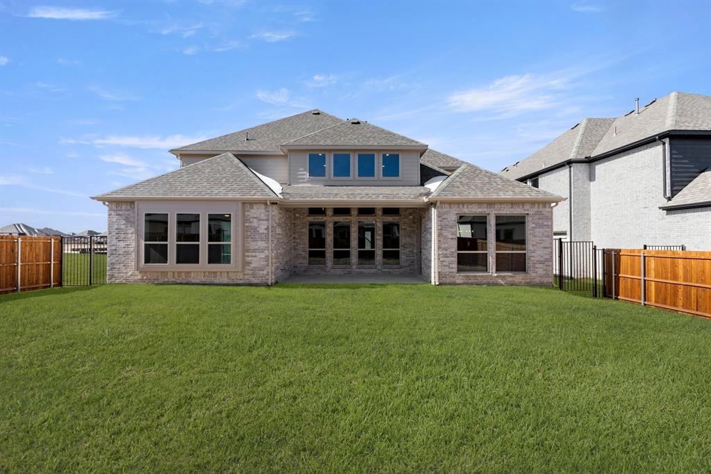 14994 Chipping Trail Frisco, TX 75035 - Photo 9 of 40 front view of a house with a garden