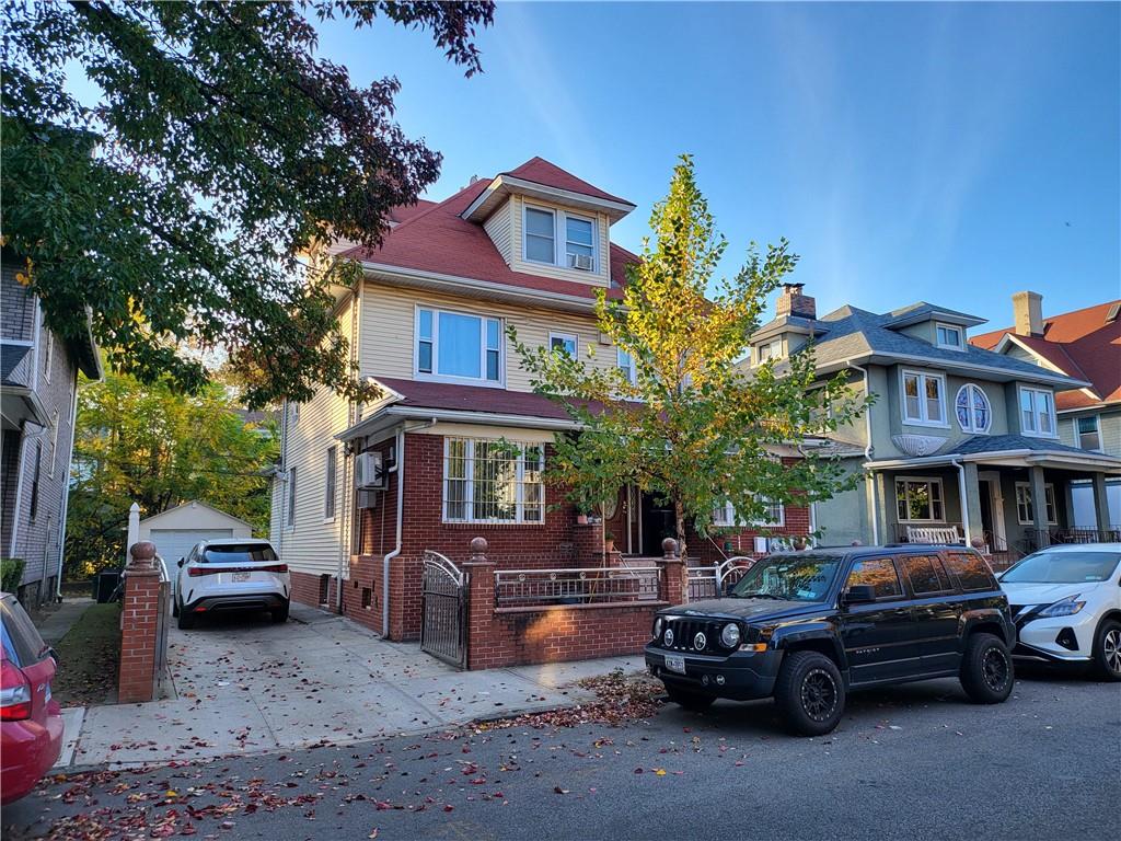 a car parked in front of a house