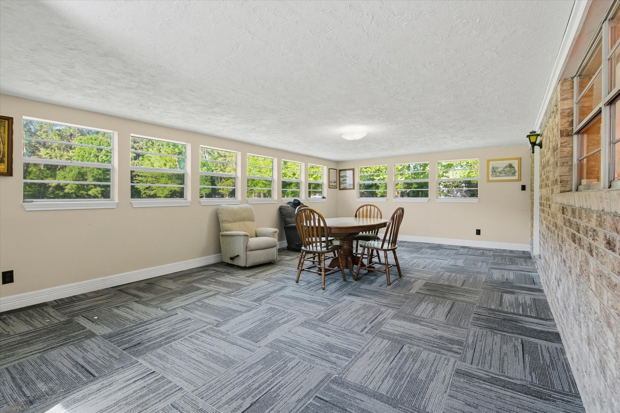411 County Road 2298 Cleveland, TX 77327 - Photo 20 of 47 a view of a dining room with furniture a rug and wooden floor