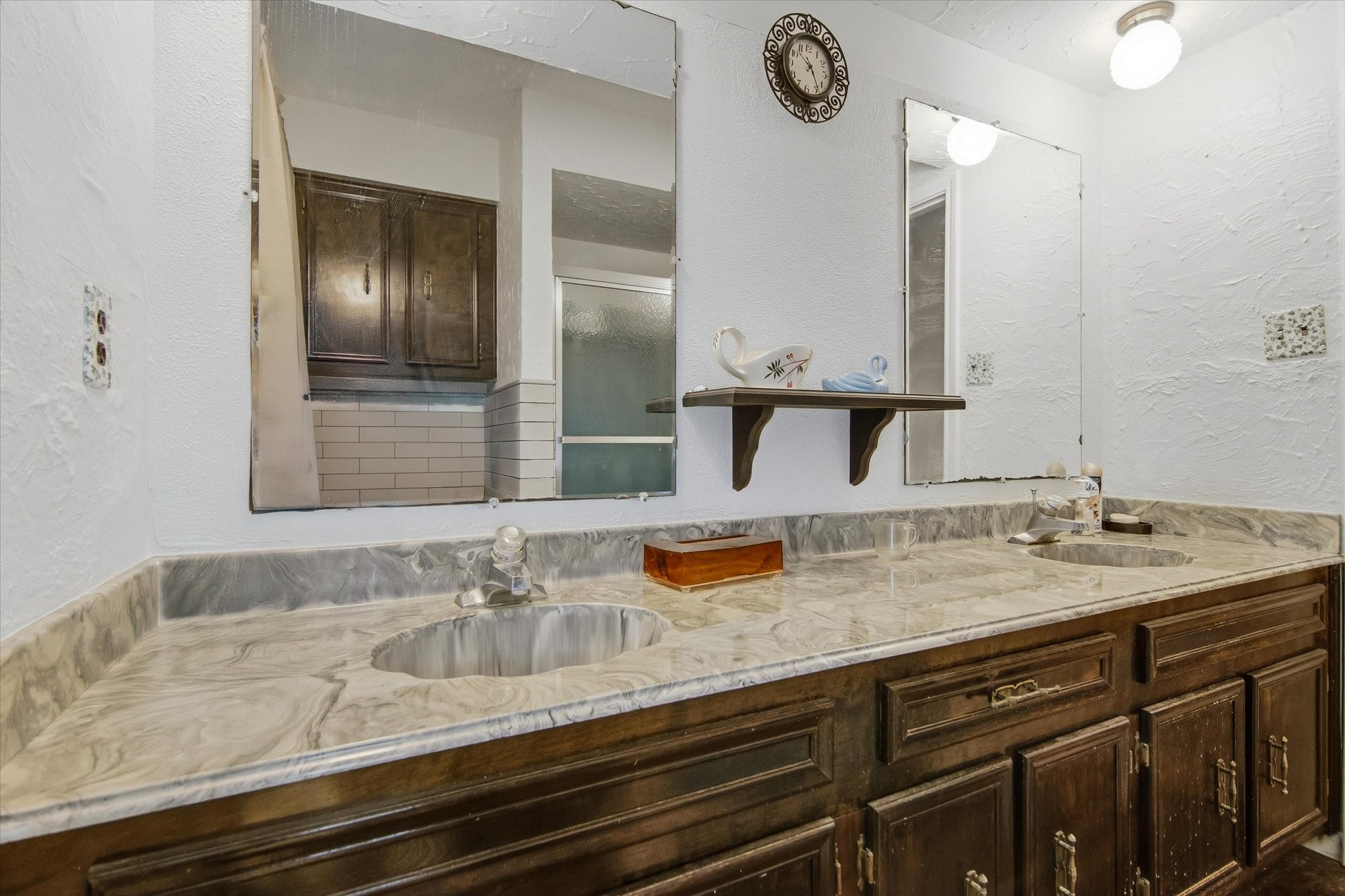 411 County Road 2298 Cleveland, TX 77327 - Photo 33 of 47 a bathroom with a sink and a mirror