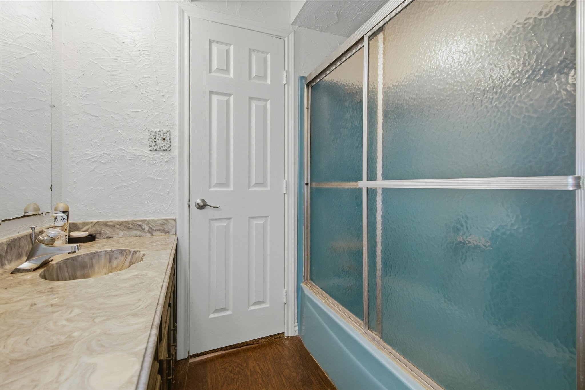 411 County Road 2298 Cleveland, TX 77327 - Photo 34 of 47 a bathroom with a tub and sink