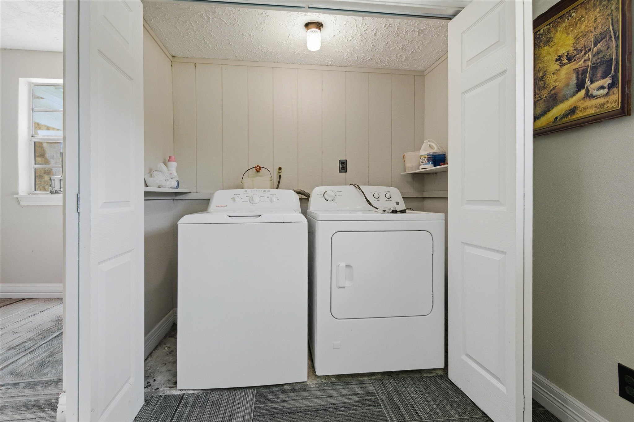 411 County Road 2298 Cleveland, TX 77327 - Photo 35 of 47 a utility room with dryer and washer