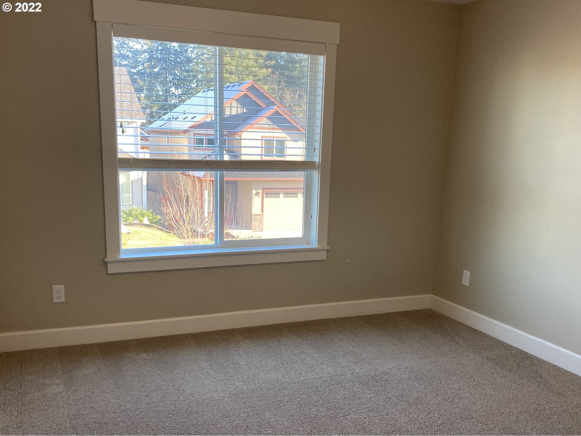 1201 South Quail Run Place Ridgefield, WA 98642 - Photo 15 of 27 an empty room with a window