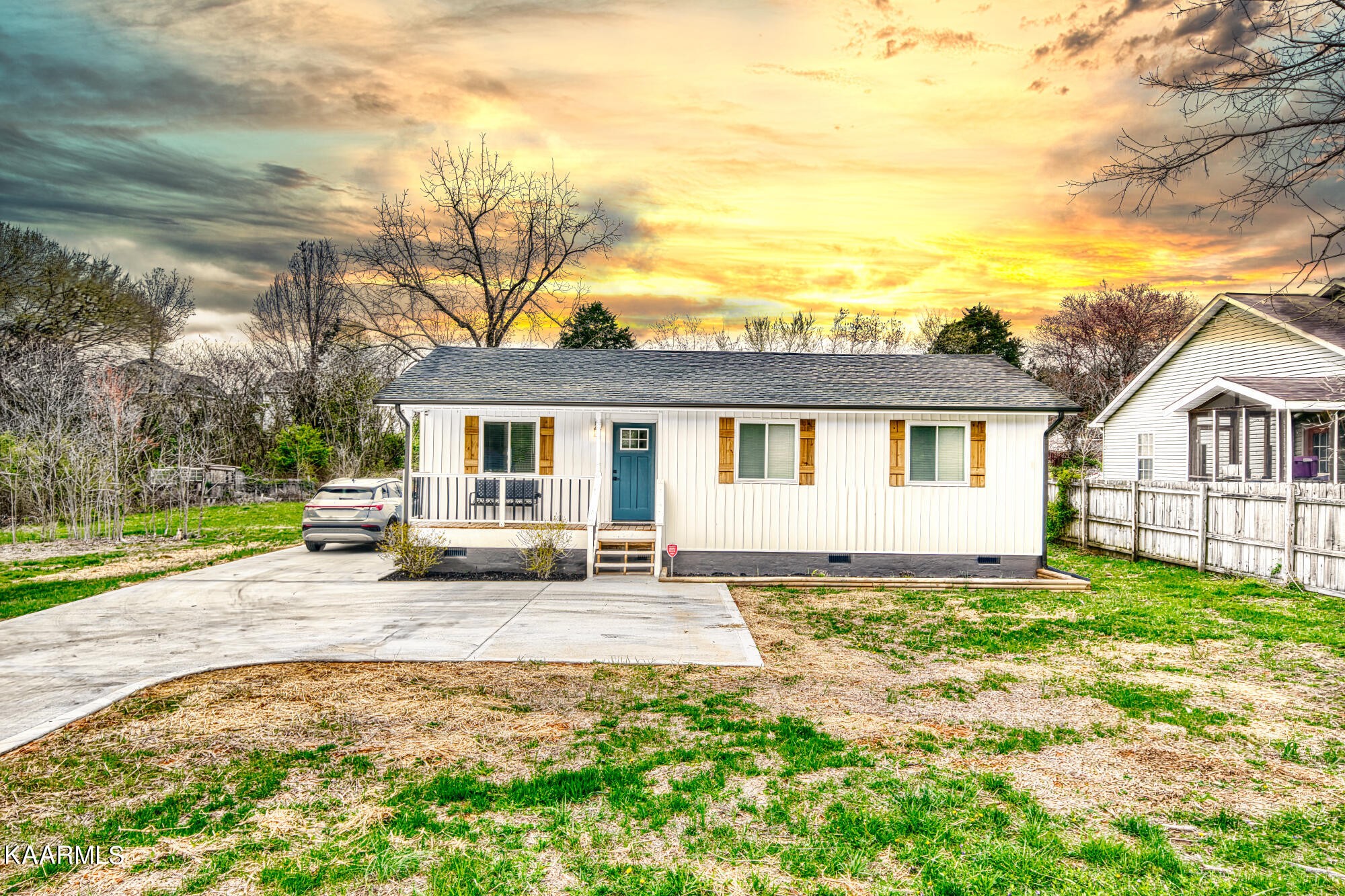1519 Cunningham Road Knoxville, TN 37918 - Photo 1 of 16 a view of a house with backyard and sitting area