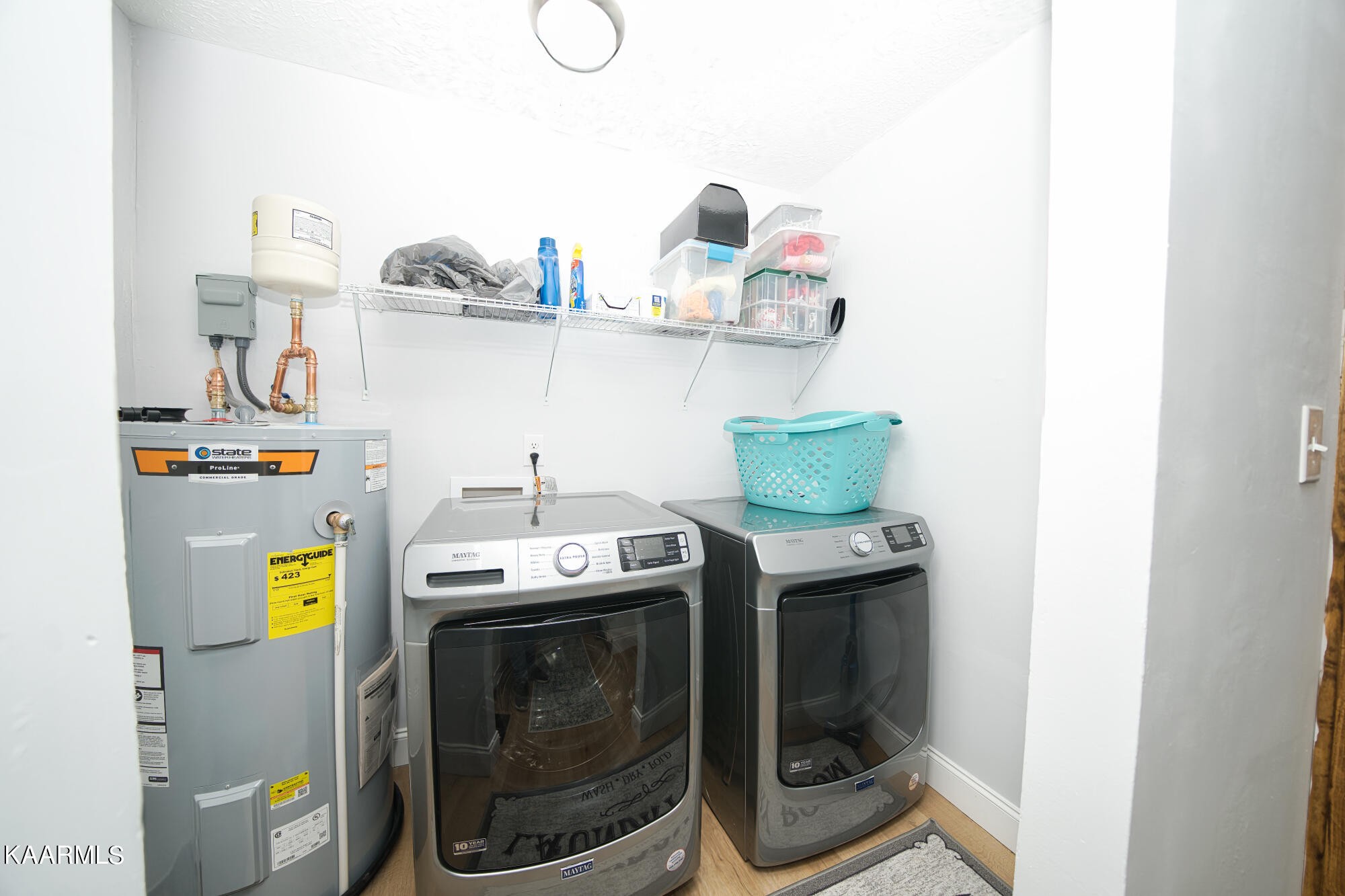 1519 Cunningham Road Knoxville, TN 37918 - Photo 12 of 16 a utility room with a sink and washer dryer