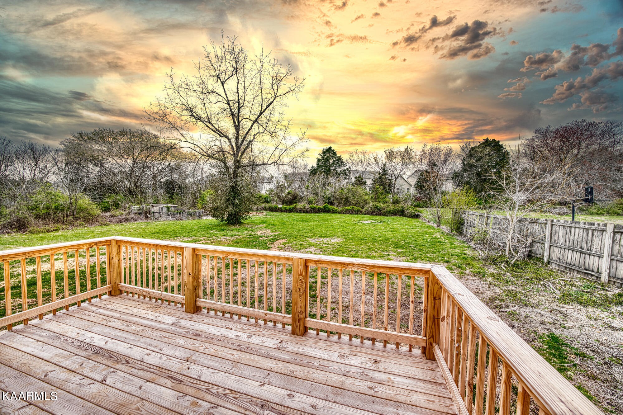 1519 Cunningham Road Knoxville, TN 37918 - Photo 13 of 16 a view of a wooden deck with a yard