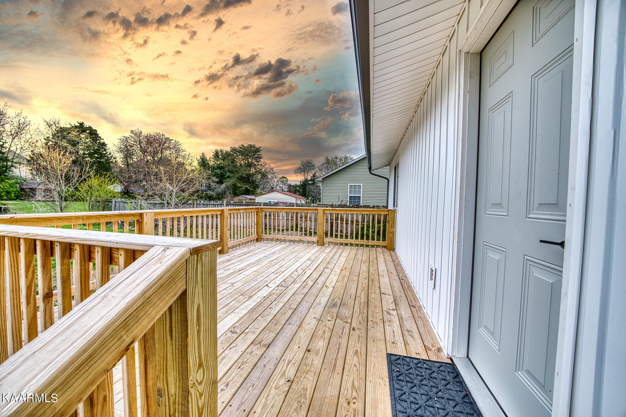 1519 Cunningham Road Knoxville, TN 37918 - Photo 14 of 16 a view of balcony with wooden floor and fence