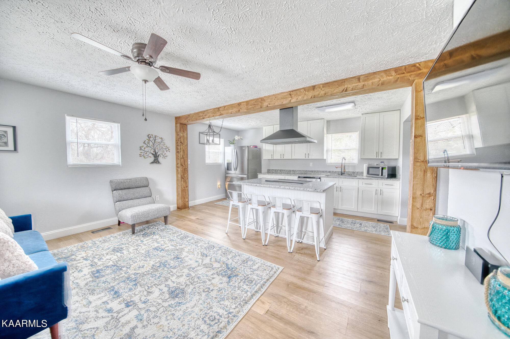 1519 Cunningham Road Knoxville, TN 37918 - Photo 6 of 16 a living room with furniture and a wooden floor