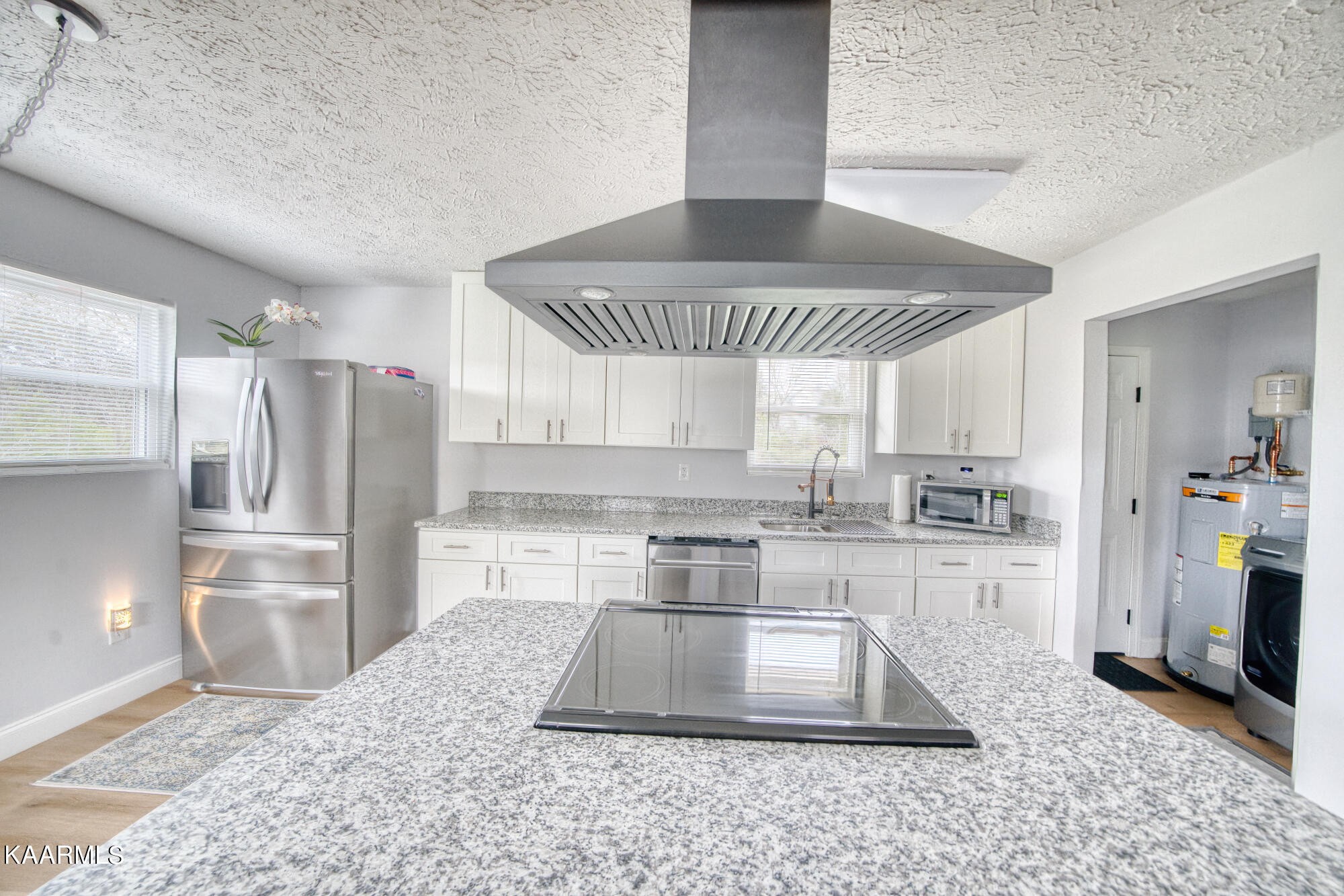 1519 Cunningham Road Knoxville, TN 37918 - Photo 7 of 16 a kitchen with refrigerator and window