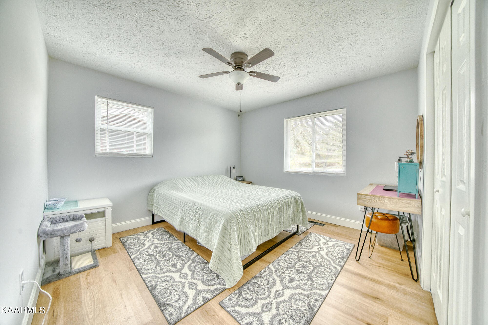 1519 Cunningham Road Knoxville, TN 37918 - Photo 9 of 16 a bedroom with a bed and a window