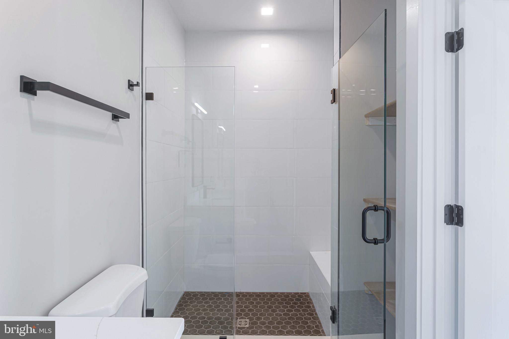 1358 Florida Avenue Northeast, Unit 207 Washington, DC 20002 - Photo 7 of 15 a bathroom with a shower and toilet