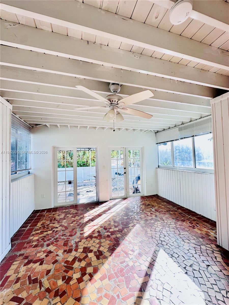 1180 Southwest 22nd Terrace, Unit 1 Miami, FL 33129 - Photo 2 of 32 a view of a room with window and hardwood floor