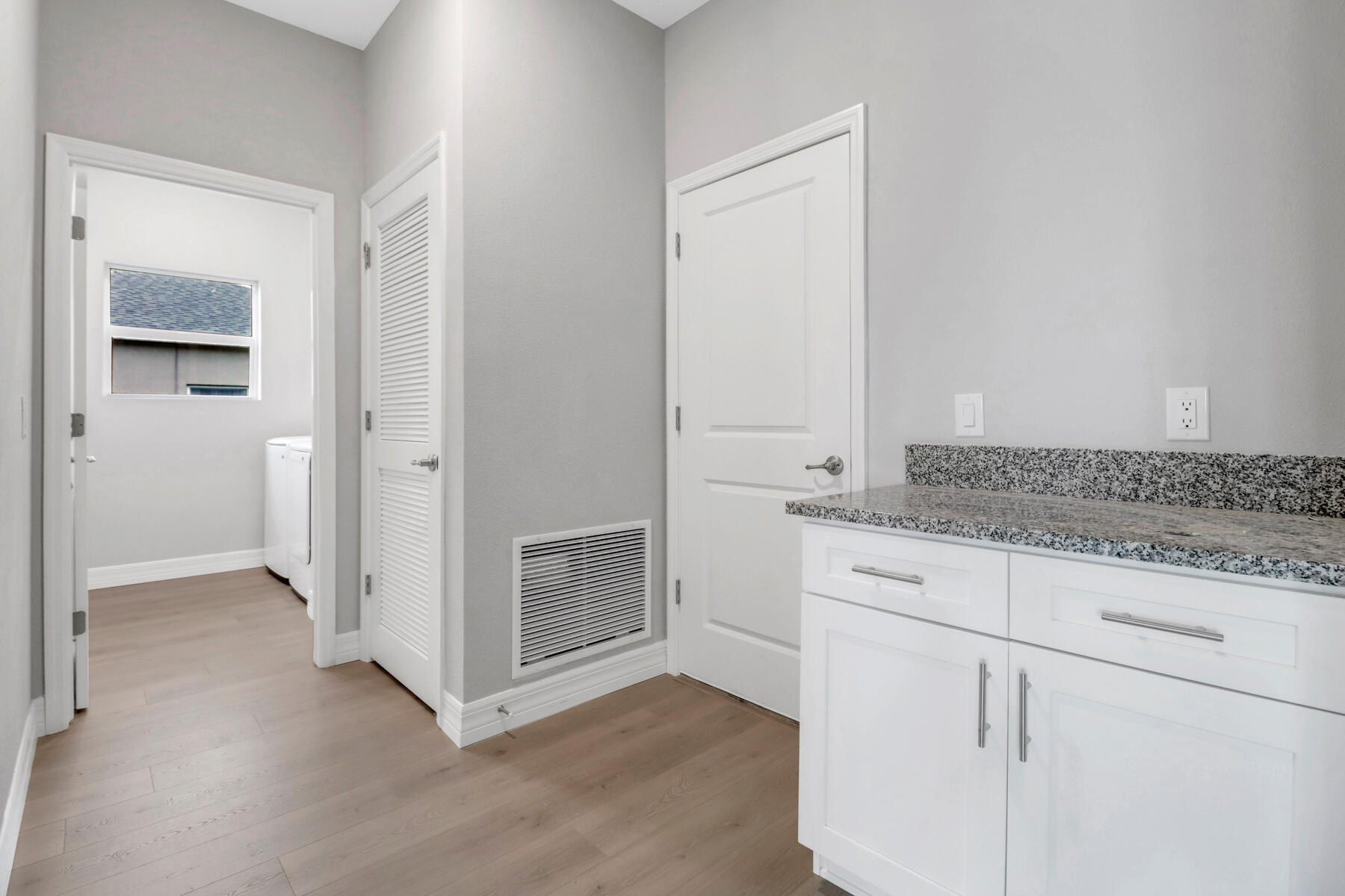 23158 Ranger Avenue Port Charlotte, FL 33954 - Photo 8 of 25 a view of cabinets and wooden floor