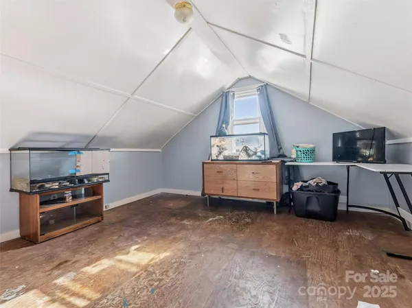 a kitchen with furniture and a stove