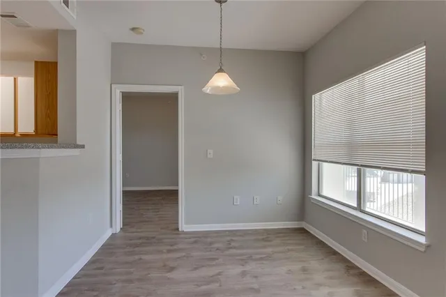 a kitchen with a stove and a microwave