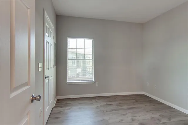 an empty room with windows