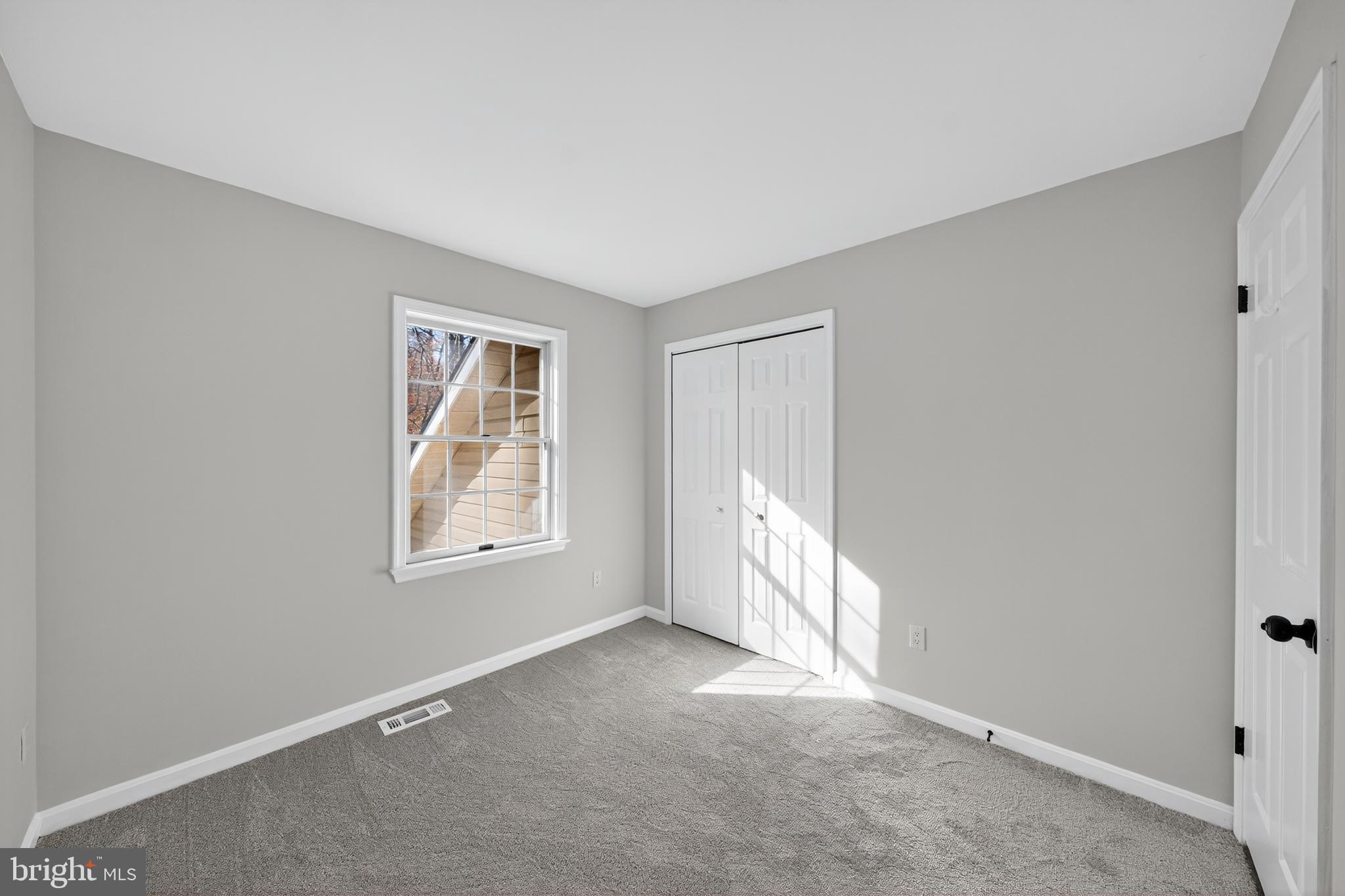 9310 Bellbeck Road Baltimore, MD 21234 - Photo 16 of 30 a view of an empty room with a window