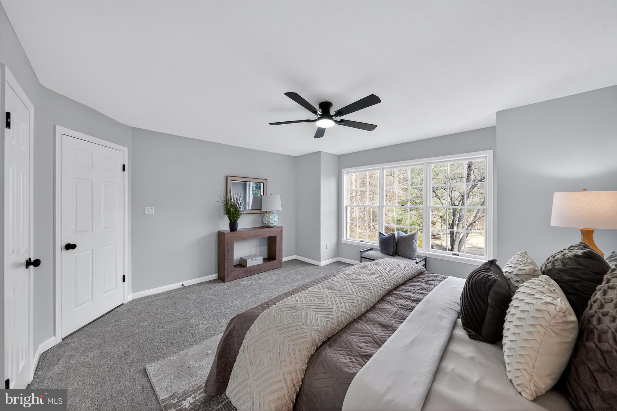 9310 Bellbeck Road Baltimore, MD 21234 - Photo 18 of 30 a bedroom with a bed and window