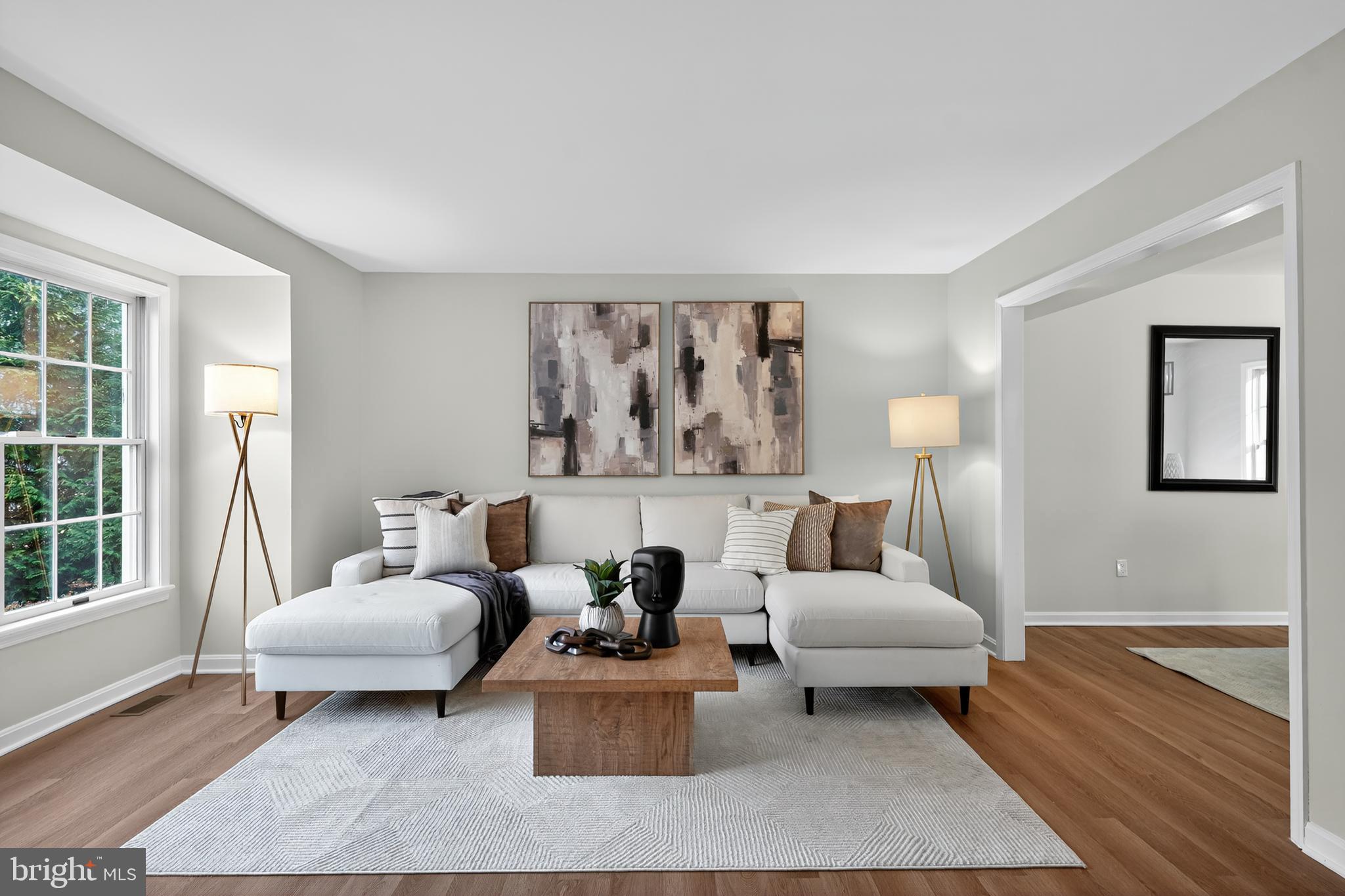 9310 Bellbeck Road Baltimore, MD 21234 - Photo 6 of 30 a living room with furniture and a large window