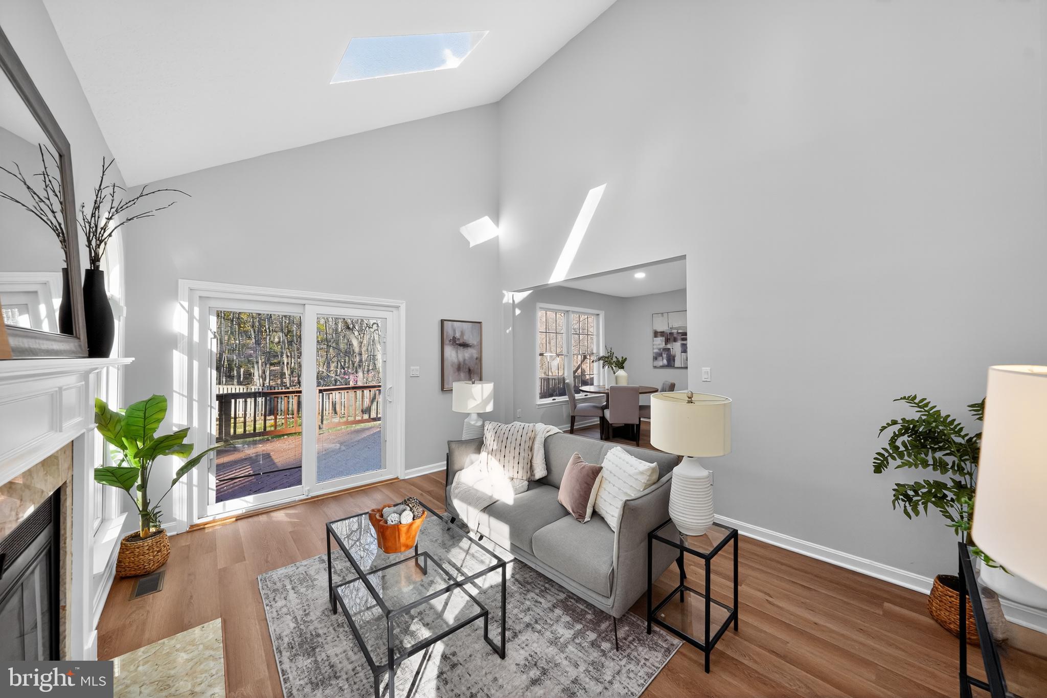 9310 Bellbeck Road Baltimore, MD 21234 - Photo 7 of 30 a living room with furniture and a potted plant