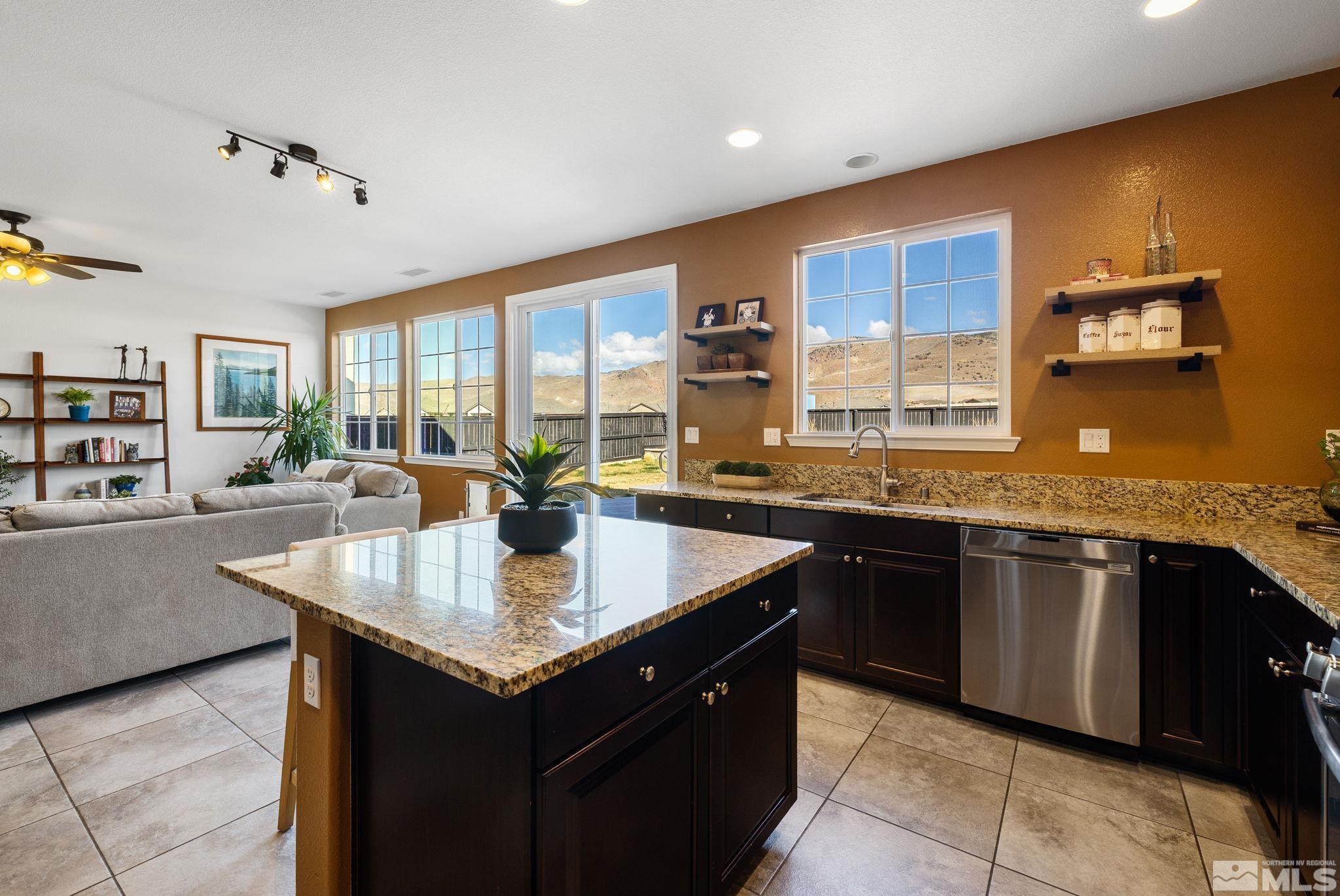 10656 Foxberry Park Drive Reno, NV 89521 - Photo 13 of 31 a very nice looking kitchen with a counter space