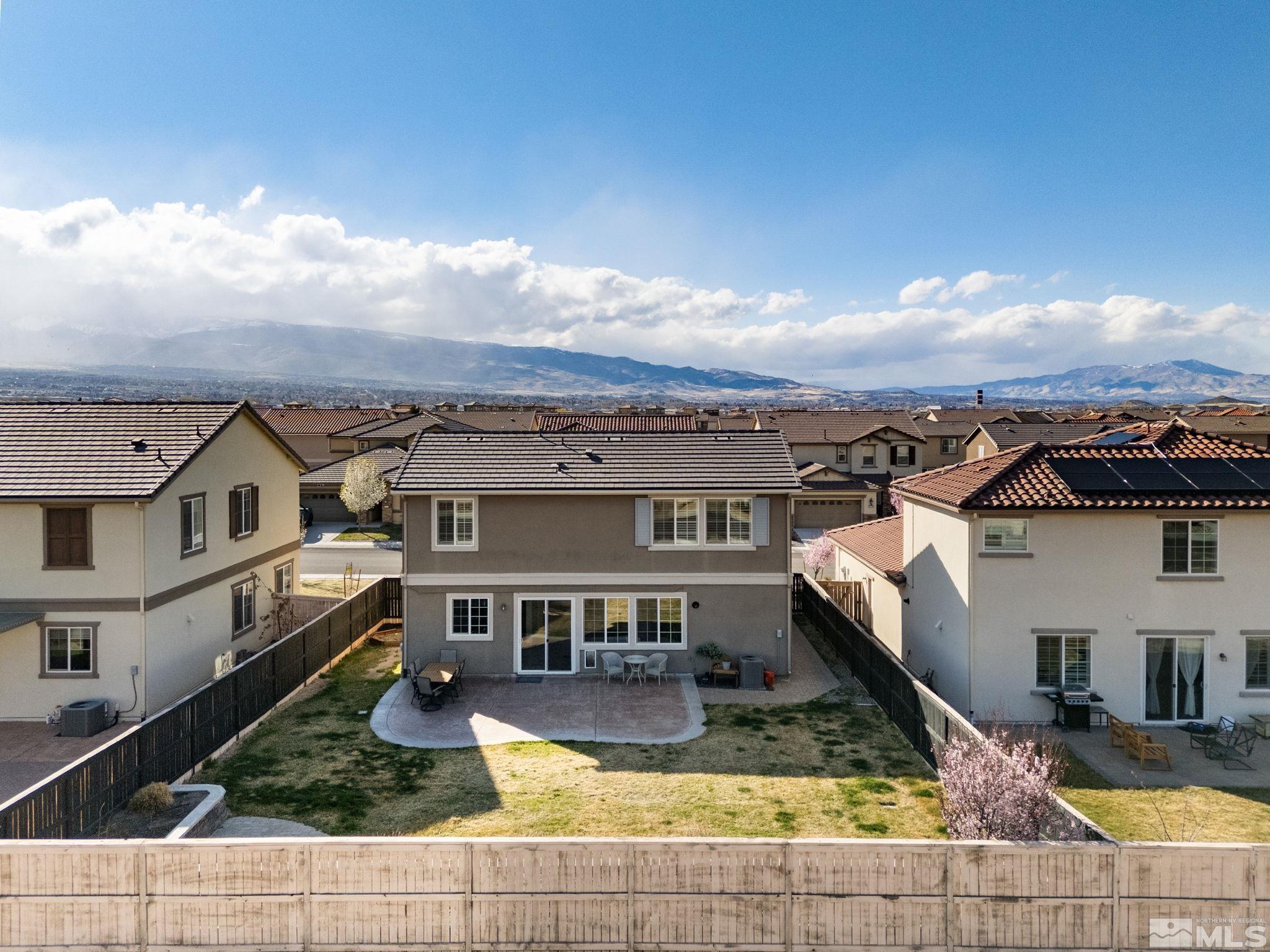 10656 Foxberry Park Drive Reno, NV 89521 - Photo 26 of 31 an aerial view of residential houses with yard
