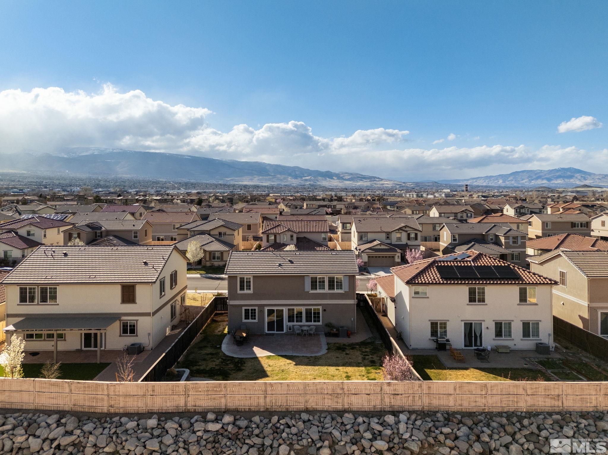 10656 Foxberry Park Drive Reno, NV 89521 - Photo 27 of 31 an aerial view of residential houses with yard