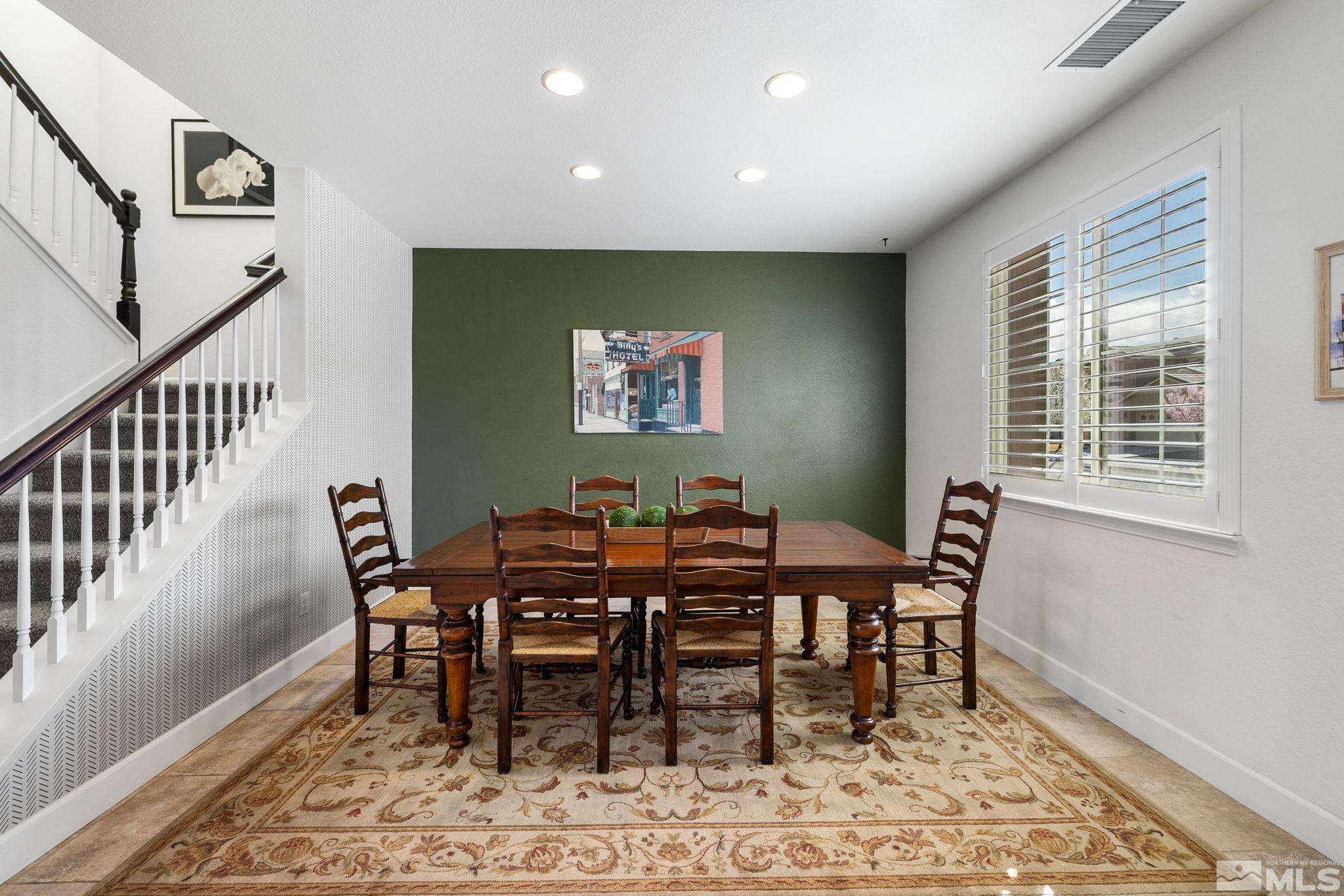 10656 Foxberry Park Drive Reno, NV 89521 - Photo 5 of 31 a view of a dining room with furniture