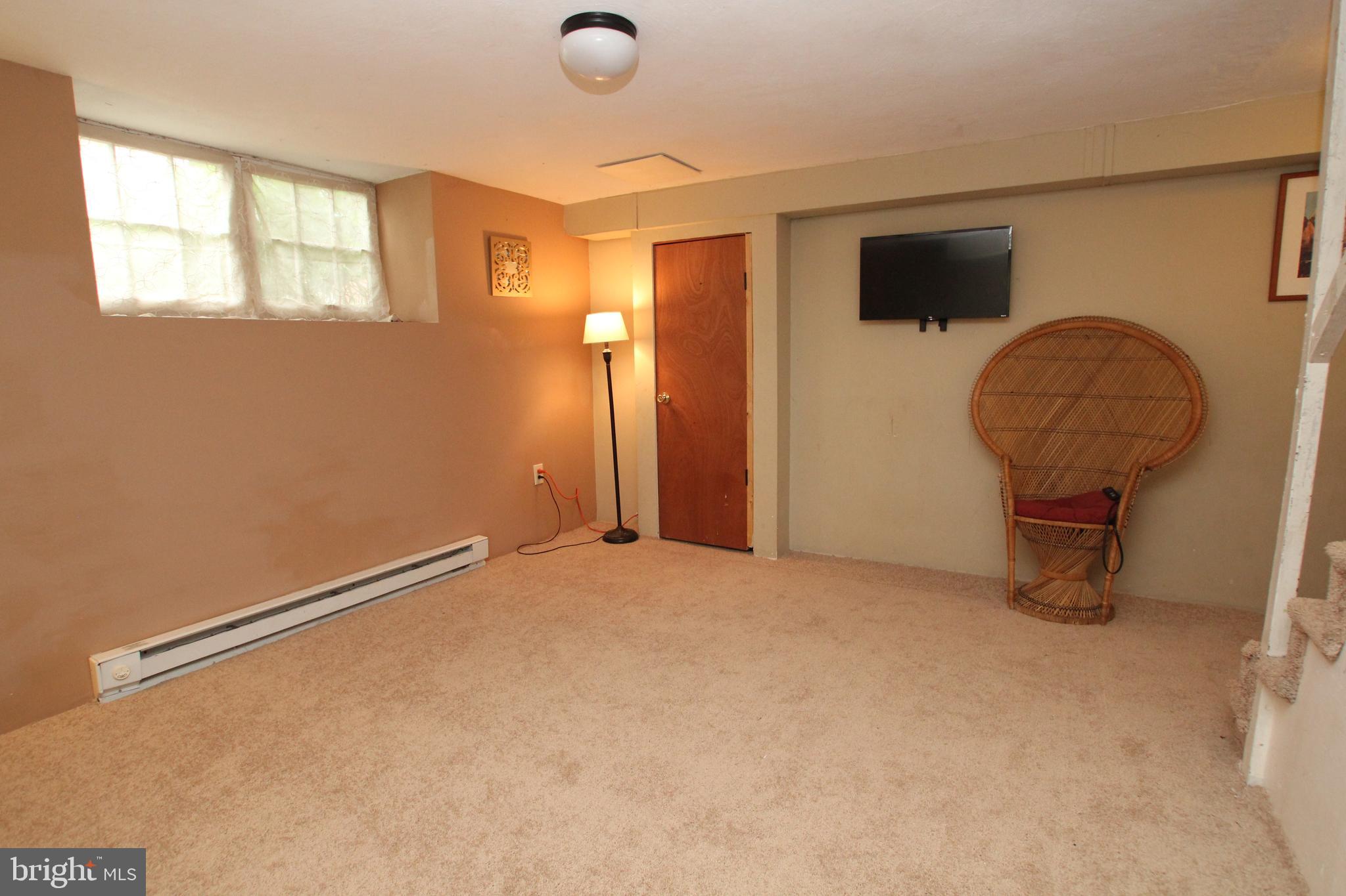 7352 Ryers Avenue Philadelphia, PA 19111 - Photo 14 of 21 finished basement area, add. large unfin area too