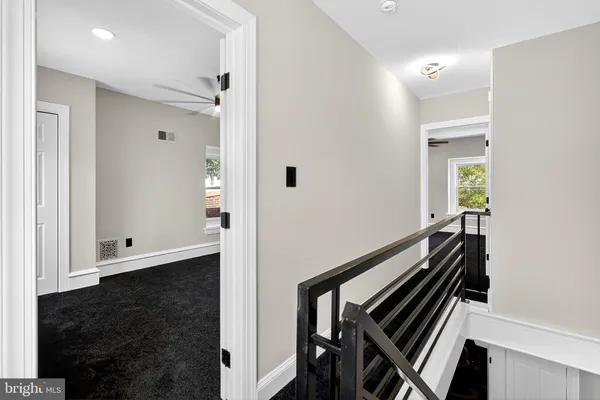workspace with wooden floor and stairs