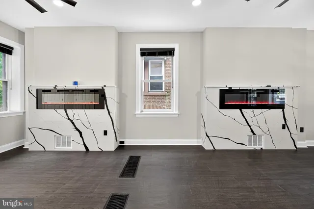 a view of entryway with wooden floor