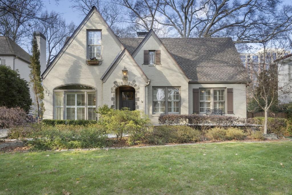 37 26th Street Northwest Atlanta, GA 30309 - Photo 1 of 1 a front view of a house with garden