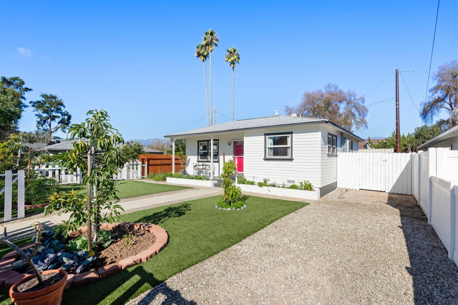 385 Sunset Avenue Oak View, CA 93022 - Photo 3 of 27 a front view of a house with garden