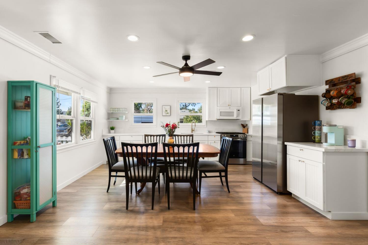 385 Sunset Avenue Oak View, CA 93022 - Photo 6 of 27 a view of a dining room with furniture window and wooden floor