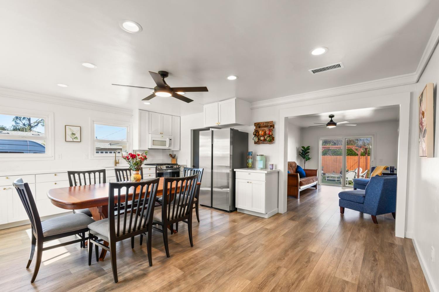 385 Sunset Avenue Oak View, CA 93022 - Photo 7 of 27 a view of a dining room with furniture and wooden floor