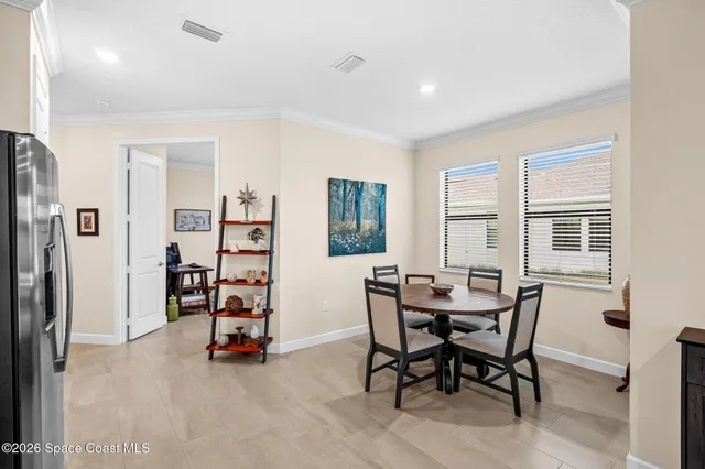 a view of a livingroom with furniture and a window