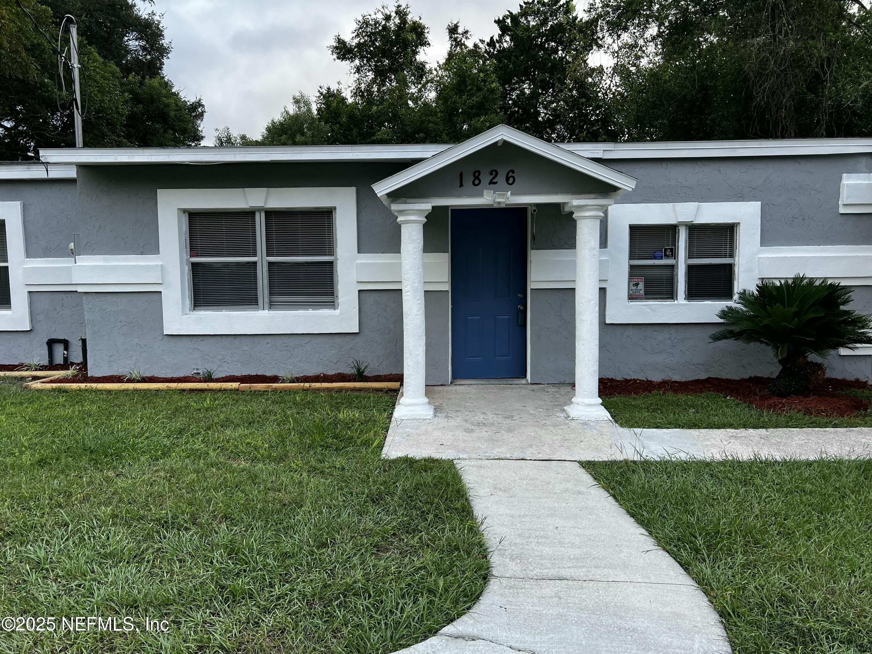 a front view of house with yard